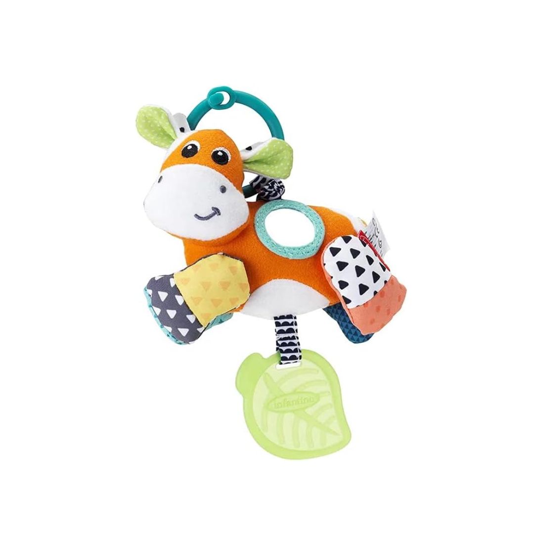Infantino cow soft toy on a white background