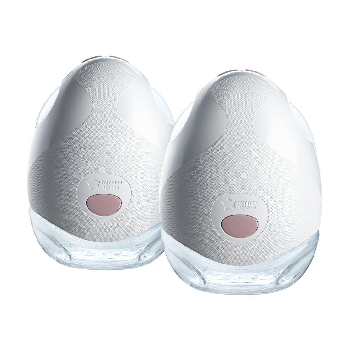 Tommee Tippee Two white electronic Breast Pump with clear bases on a white background