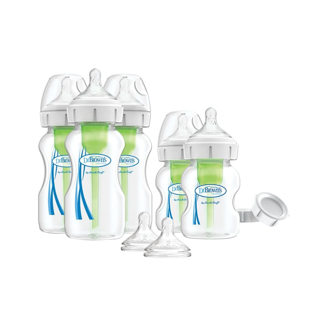 Set of Dr. Brown's baby bottles with accessories on a white background
