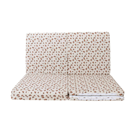 Candide Playmat, Foldable seat with leopard print pattern on a white background