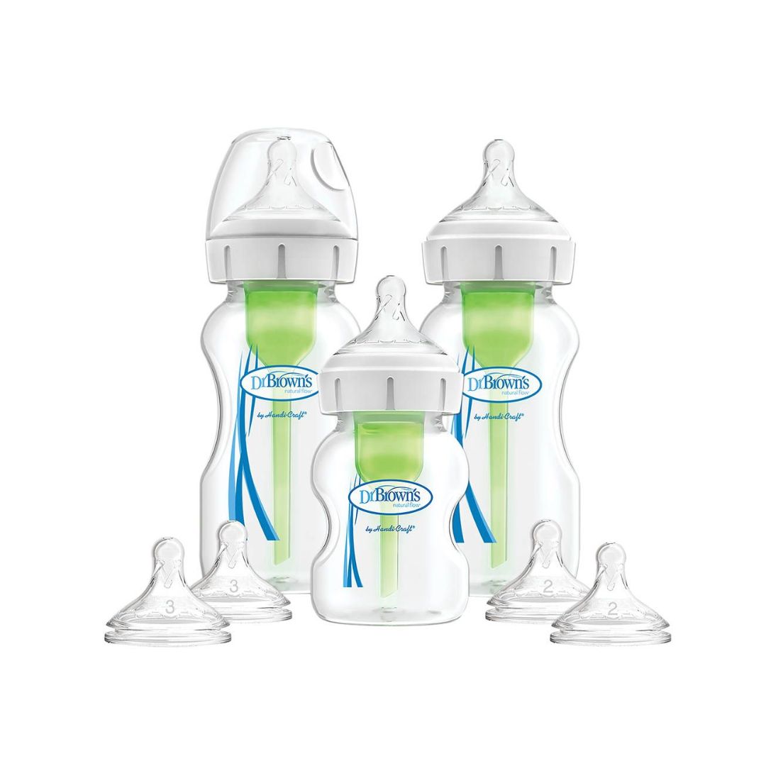 Set of Dr. Brown's baby bottles with various components on a white background