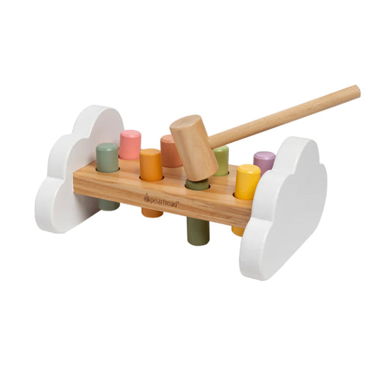 Colorful Pearhead wooden hammering toy with wooden mallet and various cylindrical wooden blocks on a white background