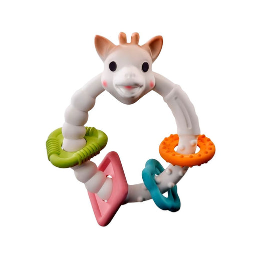 Sophie la Girafe Colo'rings teething ring toy with a giraffe head and four colorful textured rings in green, pink, orange, and teal, shown on a white background.