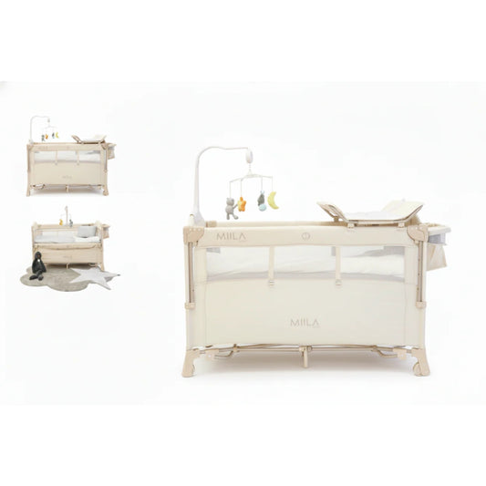 Miila Beige Baby Crib with changing table and mobile on a white background