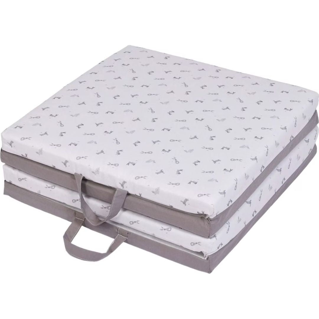 Candide Playmat Foldable mattress with patterned cover on a white background