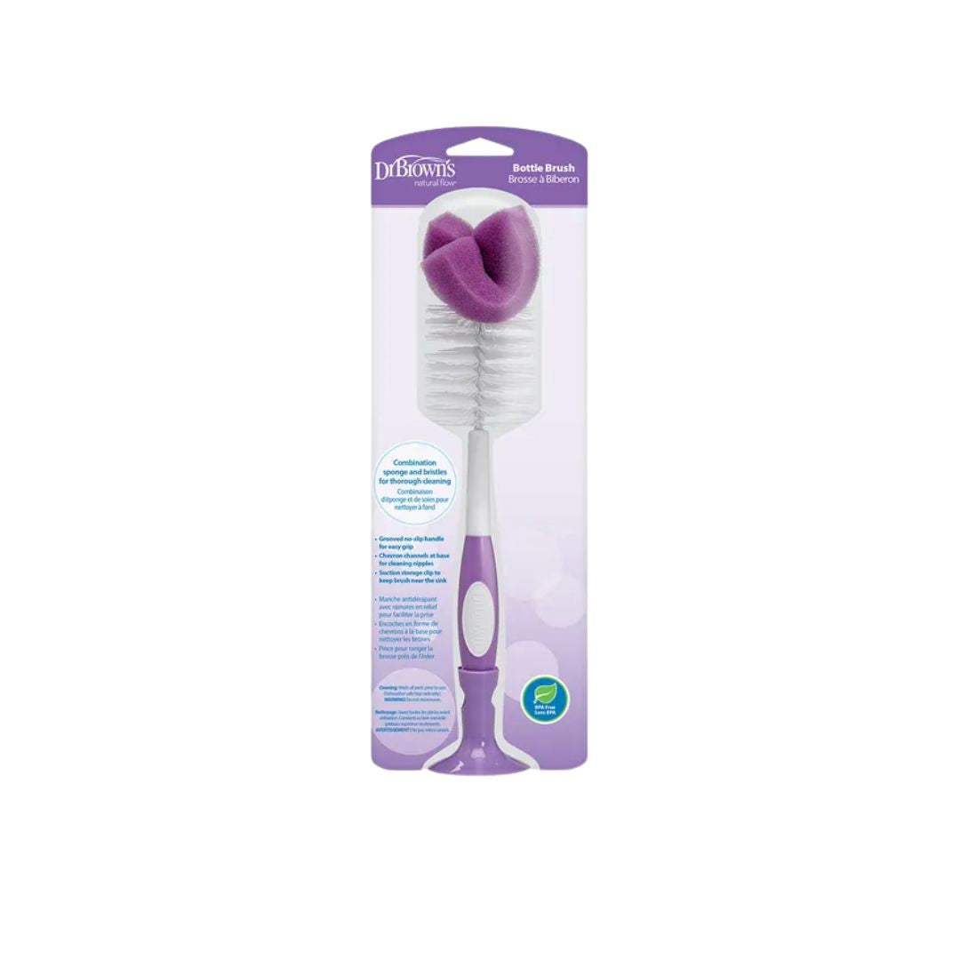 Bottle brush with purple bristle head and handle in packaging on a white background