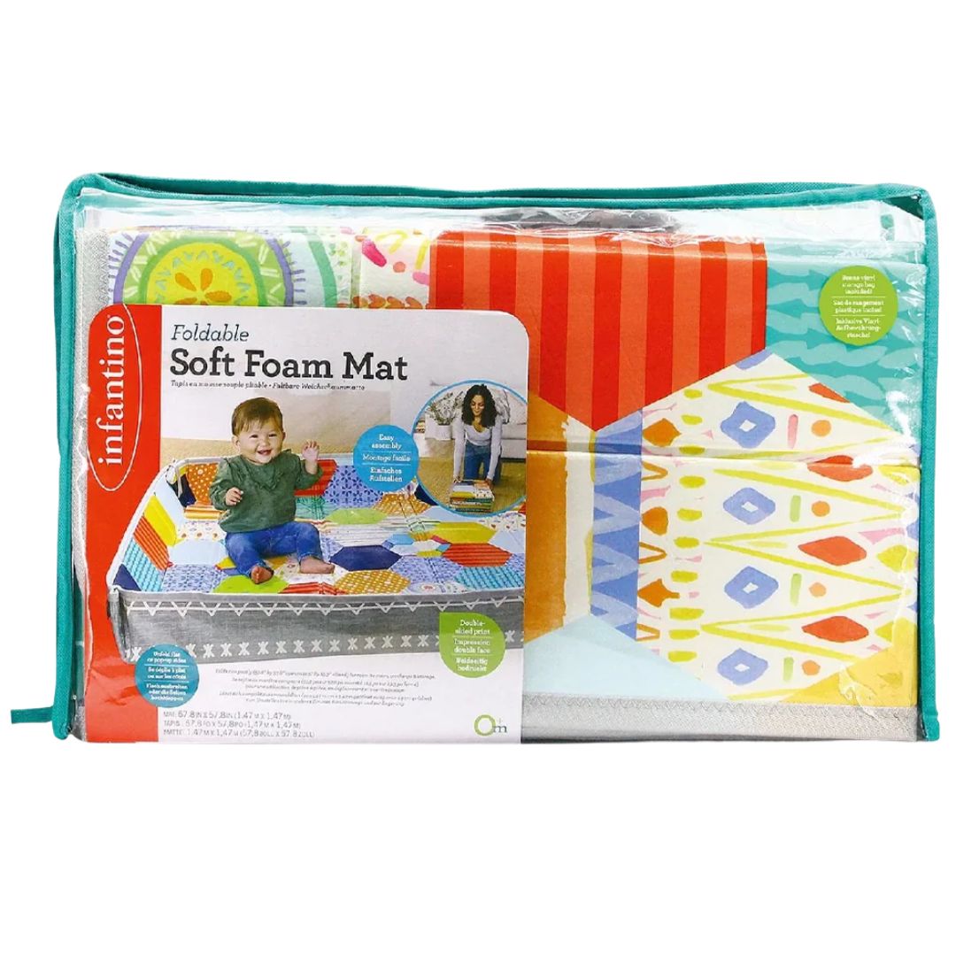 Foldable Infantino  soft foam mat with colorful patterns and packaging on a white background