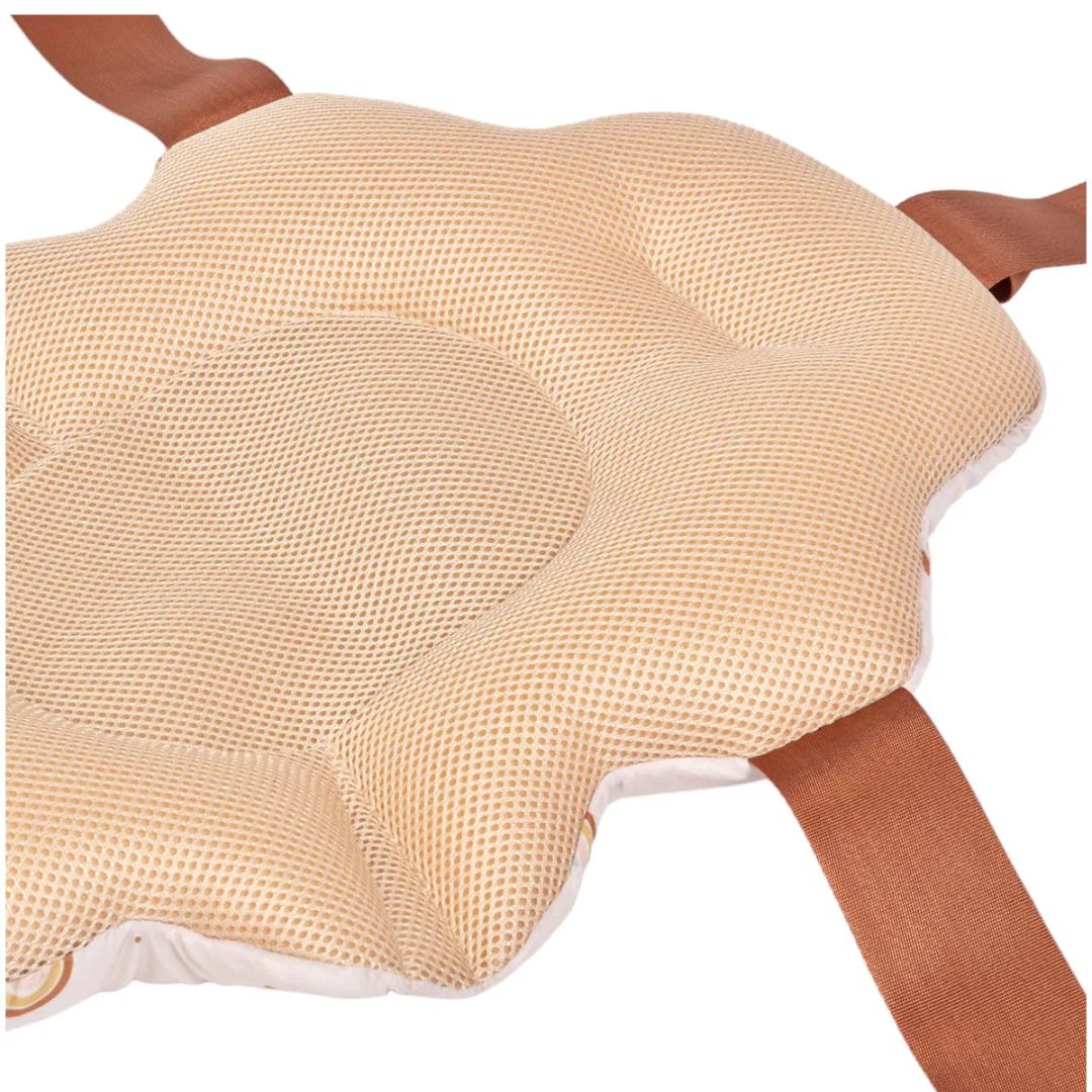Beige mesh cushion on a wooden stool with a white background