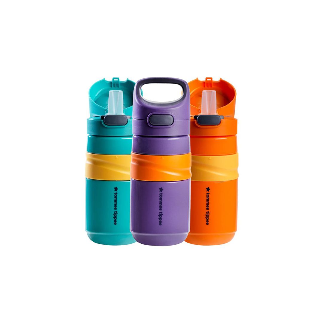 Three colorful Tommee tippee water bottles with different colored lids on a white background
