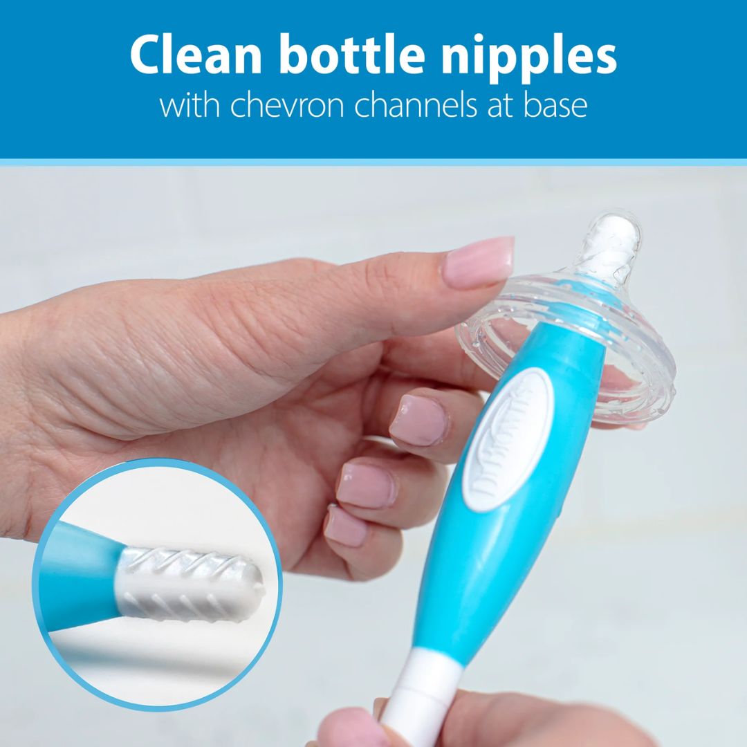 Hand holding a blue and white bottle cleaning brush with a close-up of the brush head on a light gray background.