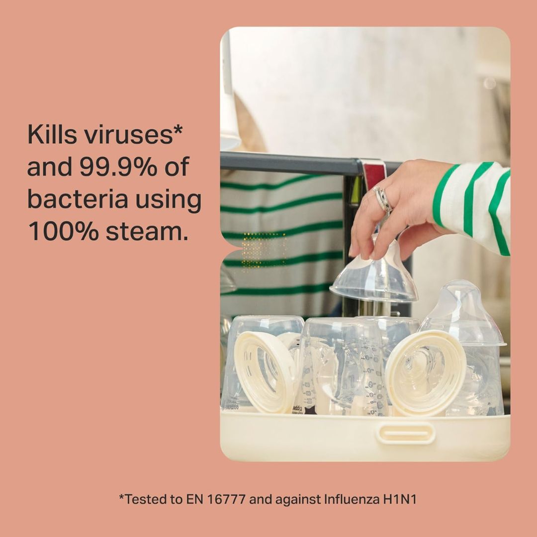 Person using a Tommee Tippee steam sterilizer with text about It