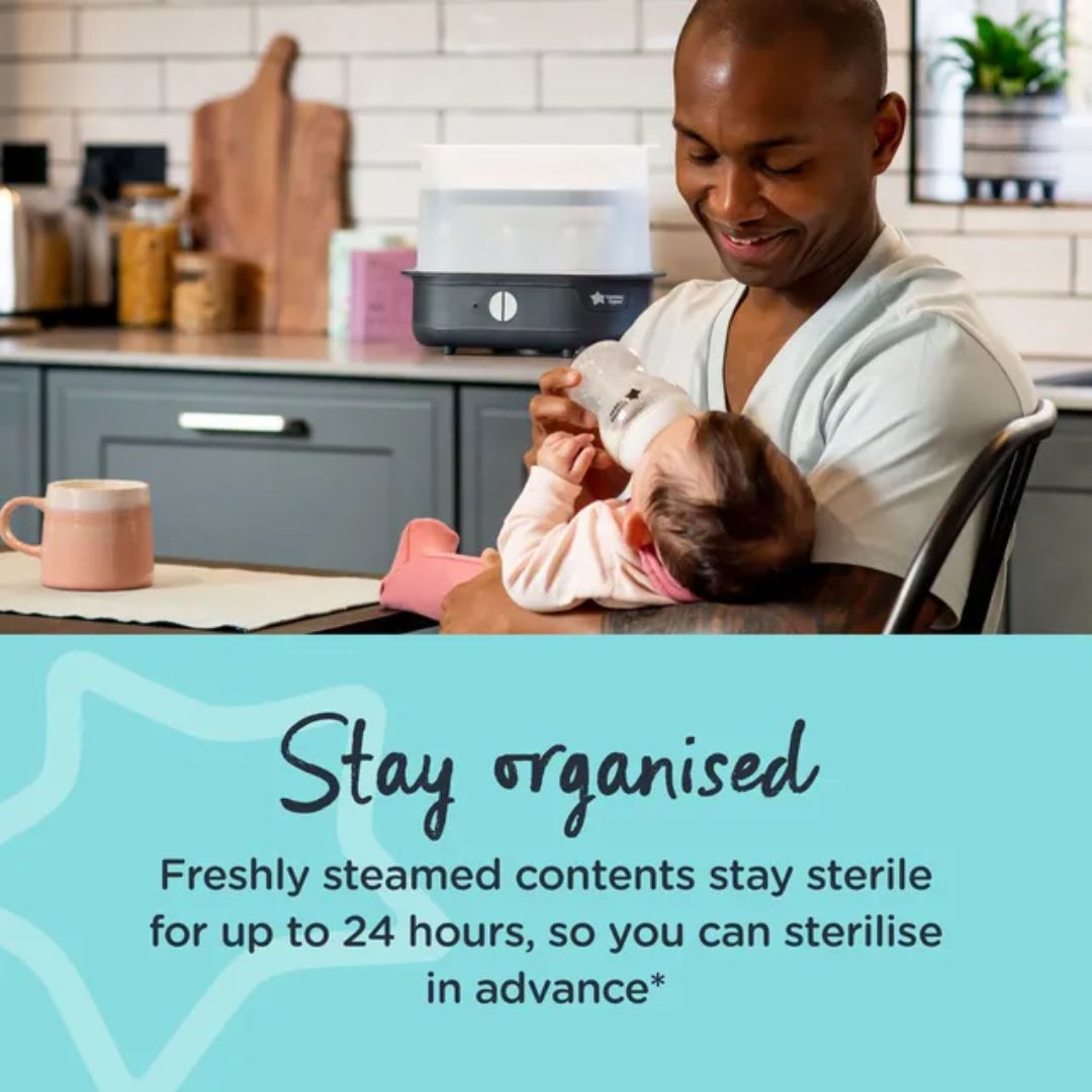 Woman holding a baby in a kitchen with a tommee tippee sterilizer, text about sterilizing contents.