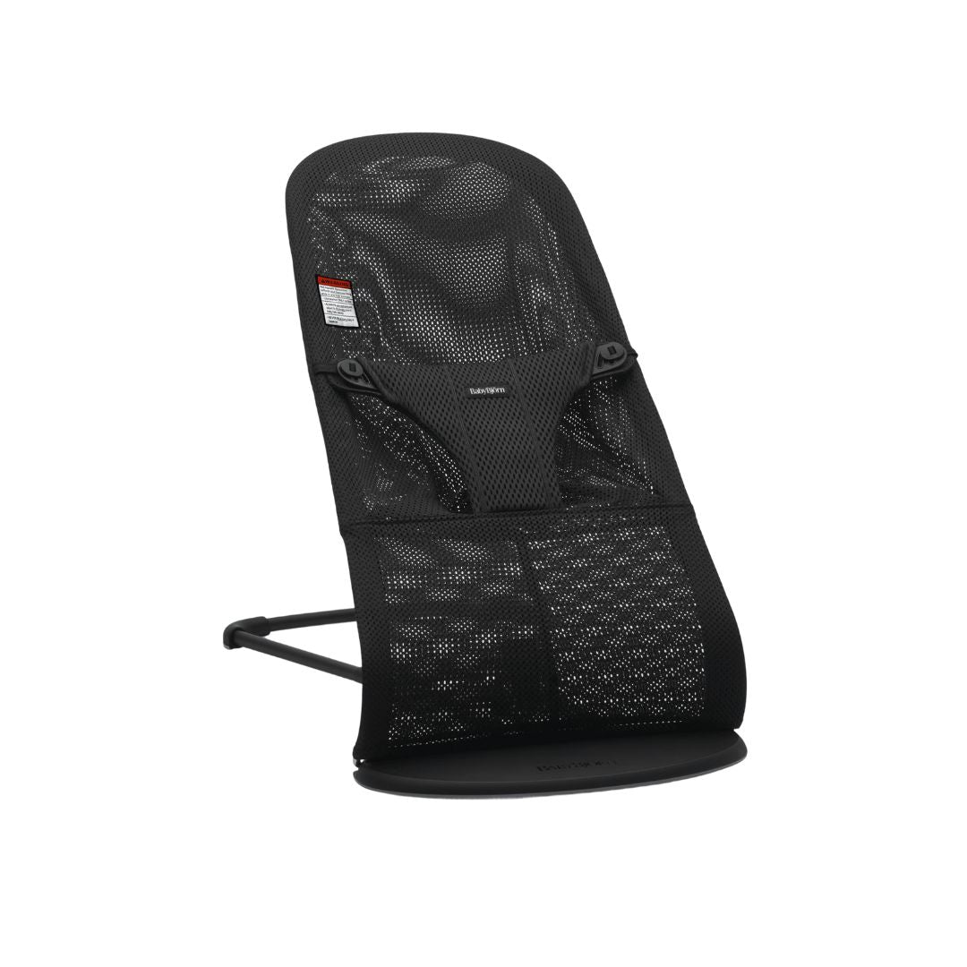 Baby Jorn black baby bouncer with mesh design on a white background