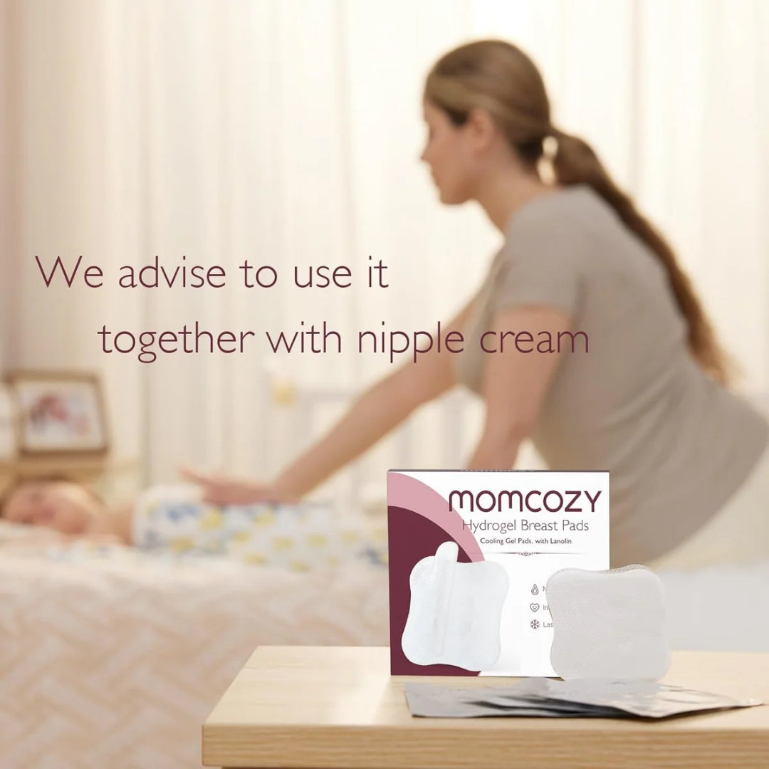 Woman lying on a bed with a box of momcozy breast pads in the foreground.
