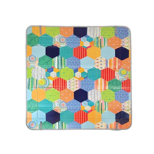 Infantino Colorful hexagonal patterned Playmat on a white background
