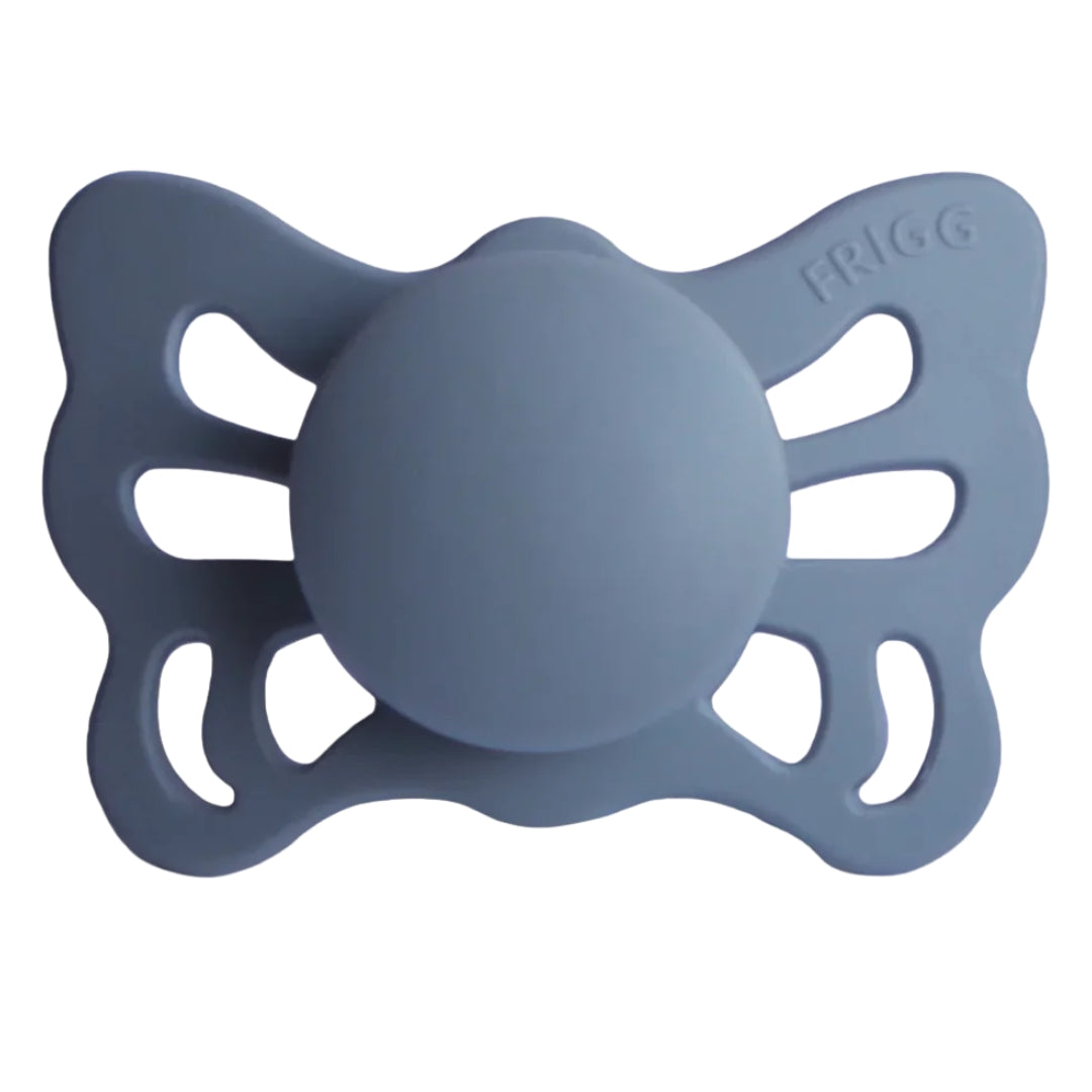 Frigg Blue butterfly-shaped pacifier on a white background