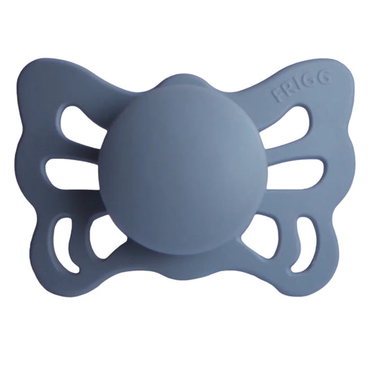 Frigg Blue butterfly-shaped pacifier on a white background