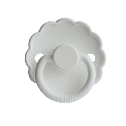 White baby pacifier with Frigg branding on a white background