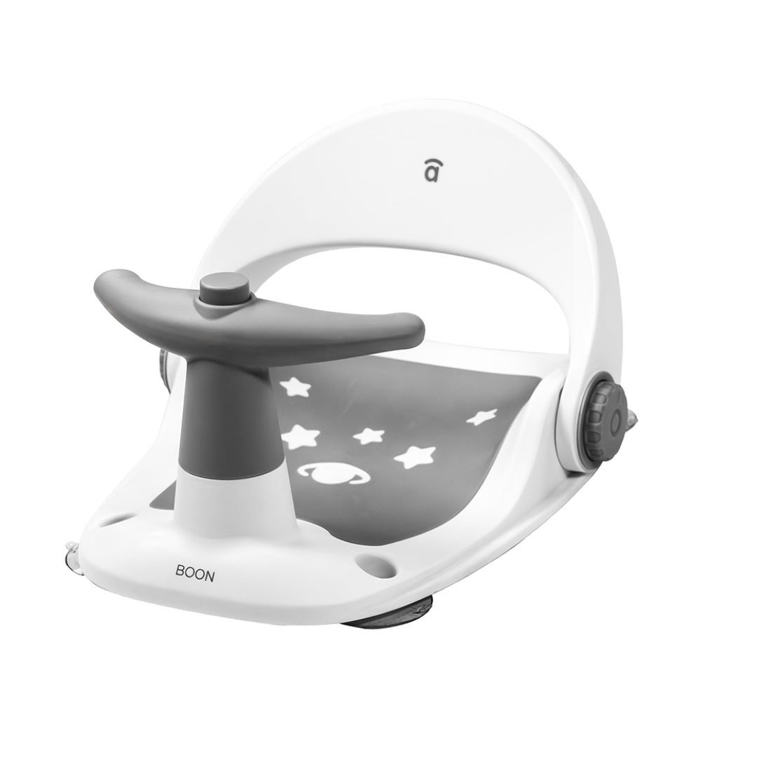 White and gray children's bath seat with star patterns on a white background