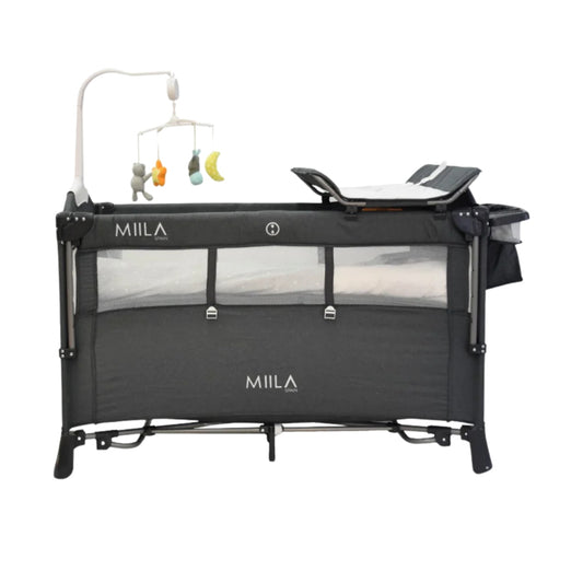 Dark Grey baby crib with 'Mila' branding on a white background