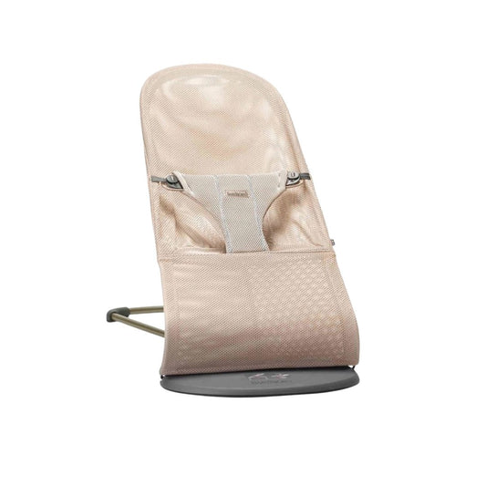 Baby jorn Beige baby bouncer with mesh back on a white background