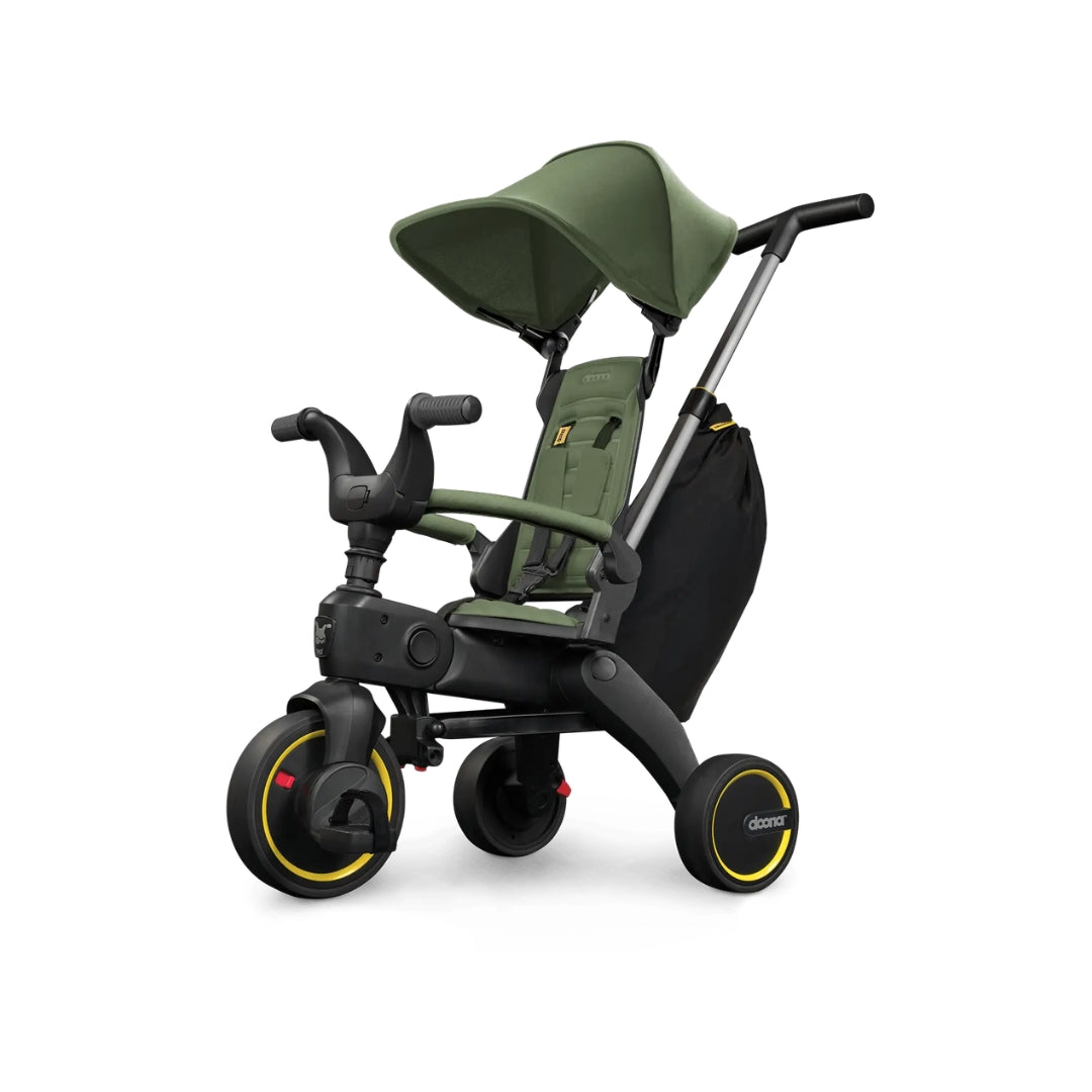 Doona Green and black children's tricycle with canopy on a white background