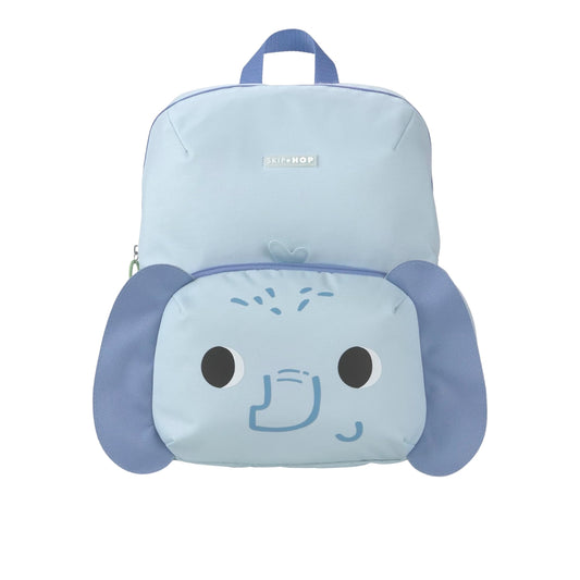 A light blue and periwinkle blue backpack designed like a cartoon dog face, featuring floppy ears, large black eyes, and a blue snout on the front pocket. The brand name 'Skip Hop' is visible on a small silver label on the upper front.