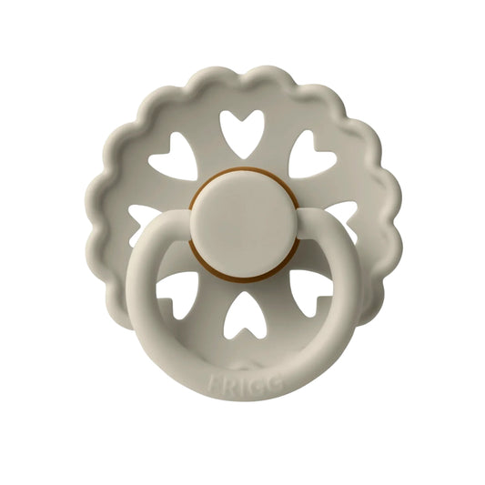 Frigg Decorative ceramic Pacifier with heart designs on a white background