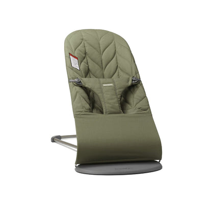 BabyBjorn Green baby bouncer chair on a white background