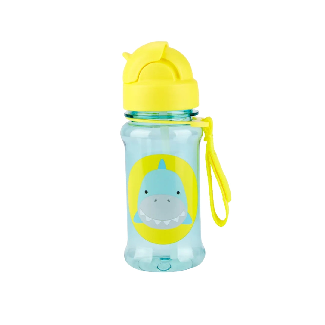 A light blue translucent kids' Skip Hop water bottle with a yellow flip-top lid, a yellow carrying loop, and a cartoon shark graphic on the front.