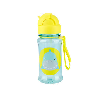 A light blue translucent kids' Skip Hop water bottle with a yellow flip-top lid, a yellow carrying loop, and a cartoon shark graphic on the front.