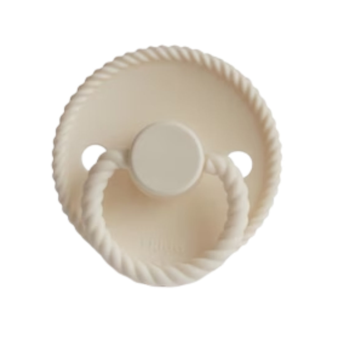 Frigg Beige baby pacifier with a textured design on a white background