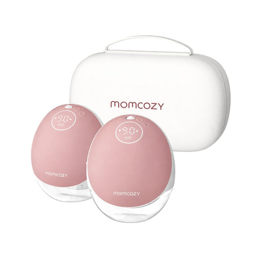 Two pink breast pumps with a white carrying case on a white background, branded 'momcozy'.
