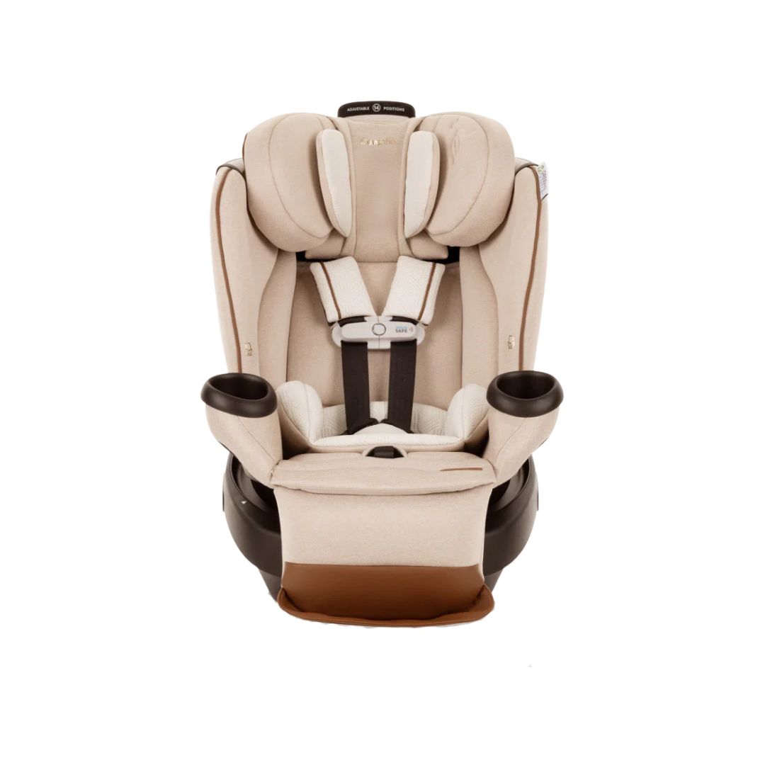 Beige and brown Evenflo car seat on a white background