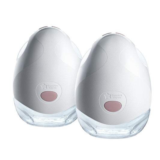 Tommee Tippee Two white electronic Breast Pump with clear bases on a white background