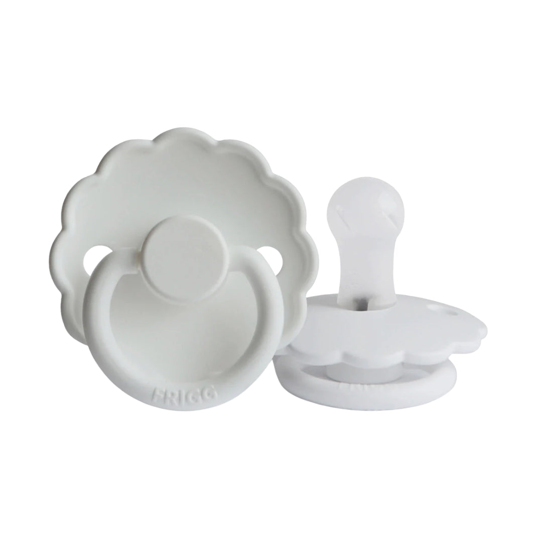 Frigg white baby pacifiers on a white background