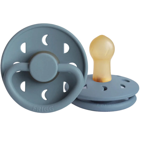 Frigg blue pacifiers with different textures on a white background