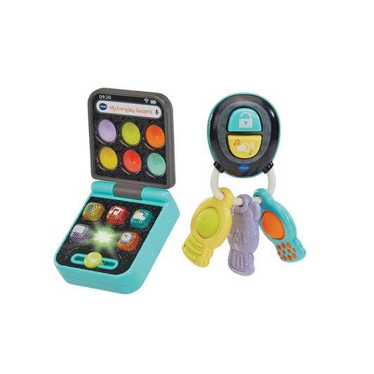 Colorful toy set with a laptop-like device and keychain on a white background