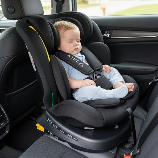 Baby in a car seat with Miila branding inside a vehicle.