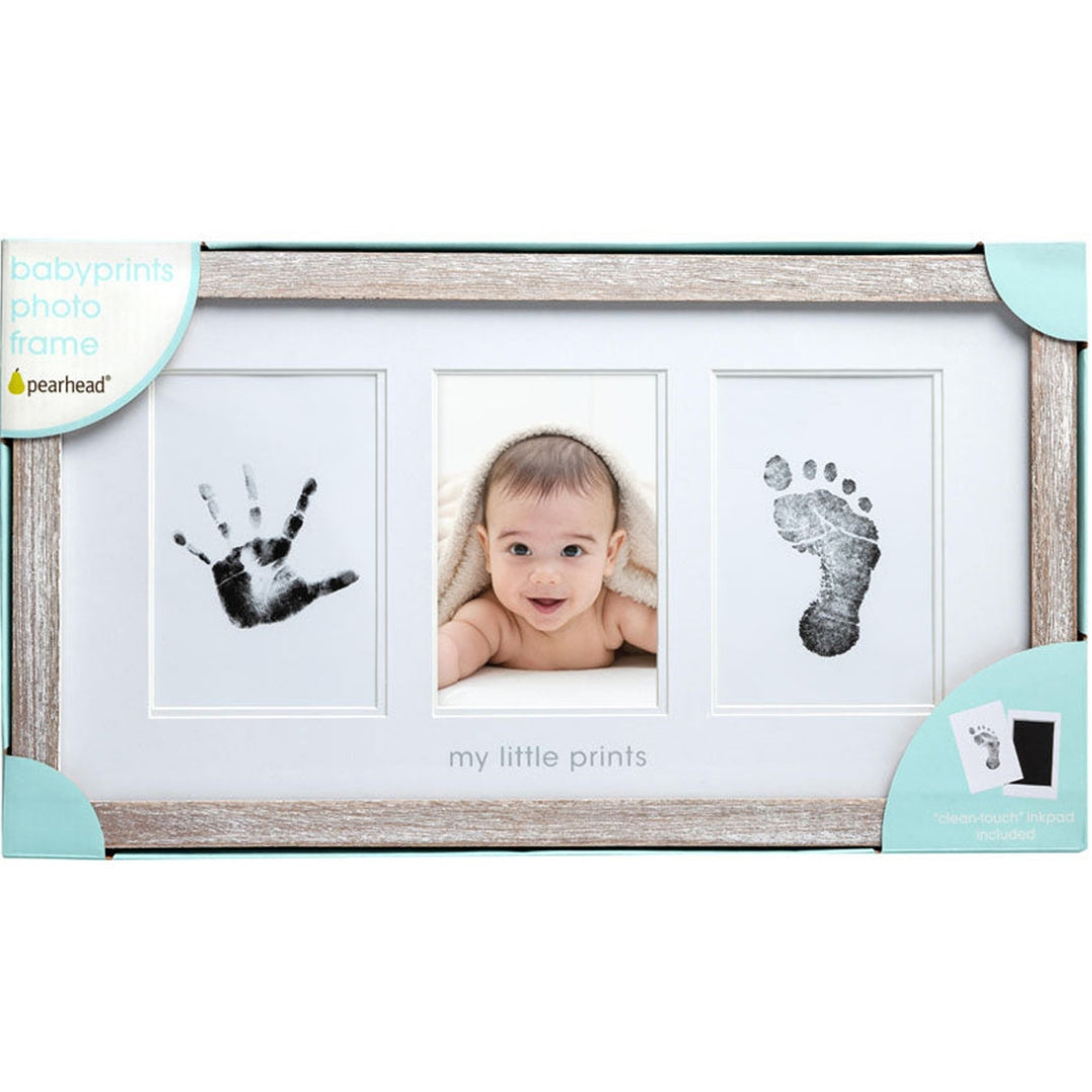 Pearhead Baby photo frame with handprint, footprint, and baby photo on a white background