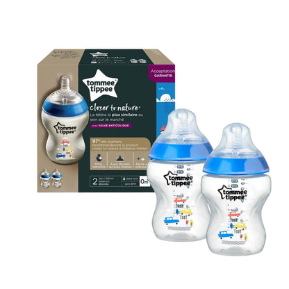 Tommee Tippee baby bottles with packaging on a white background