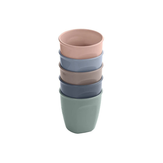 Stack of colorful ceramic vital baby  cups on a white background