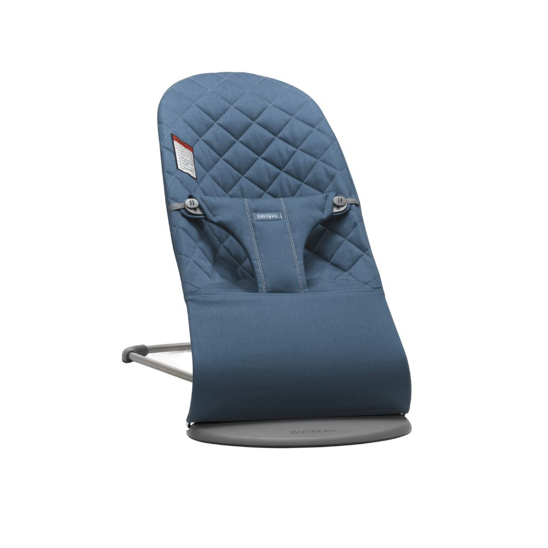 Blue baby Jorn baby bouncer chair on a white background