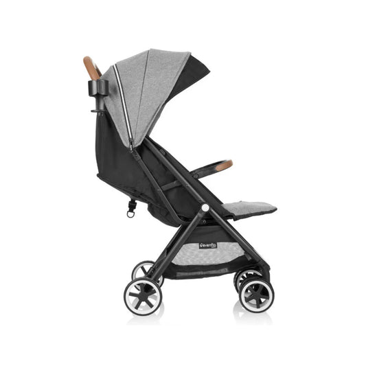 Evenflo Black and gray stroller with a sun canopy on a white background