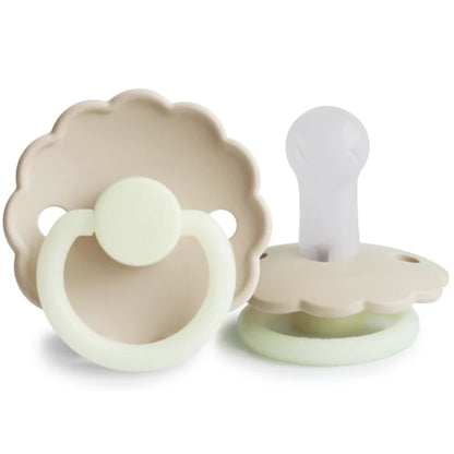 Frigg beige pacifiers on a white background