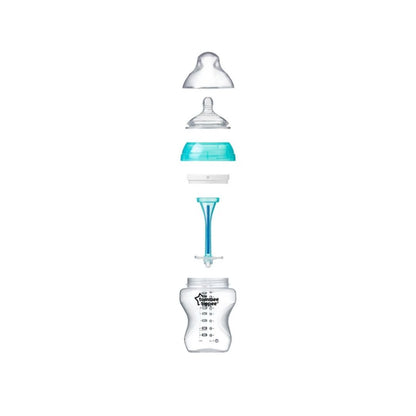 Baby bottle with components on a white background