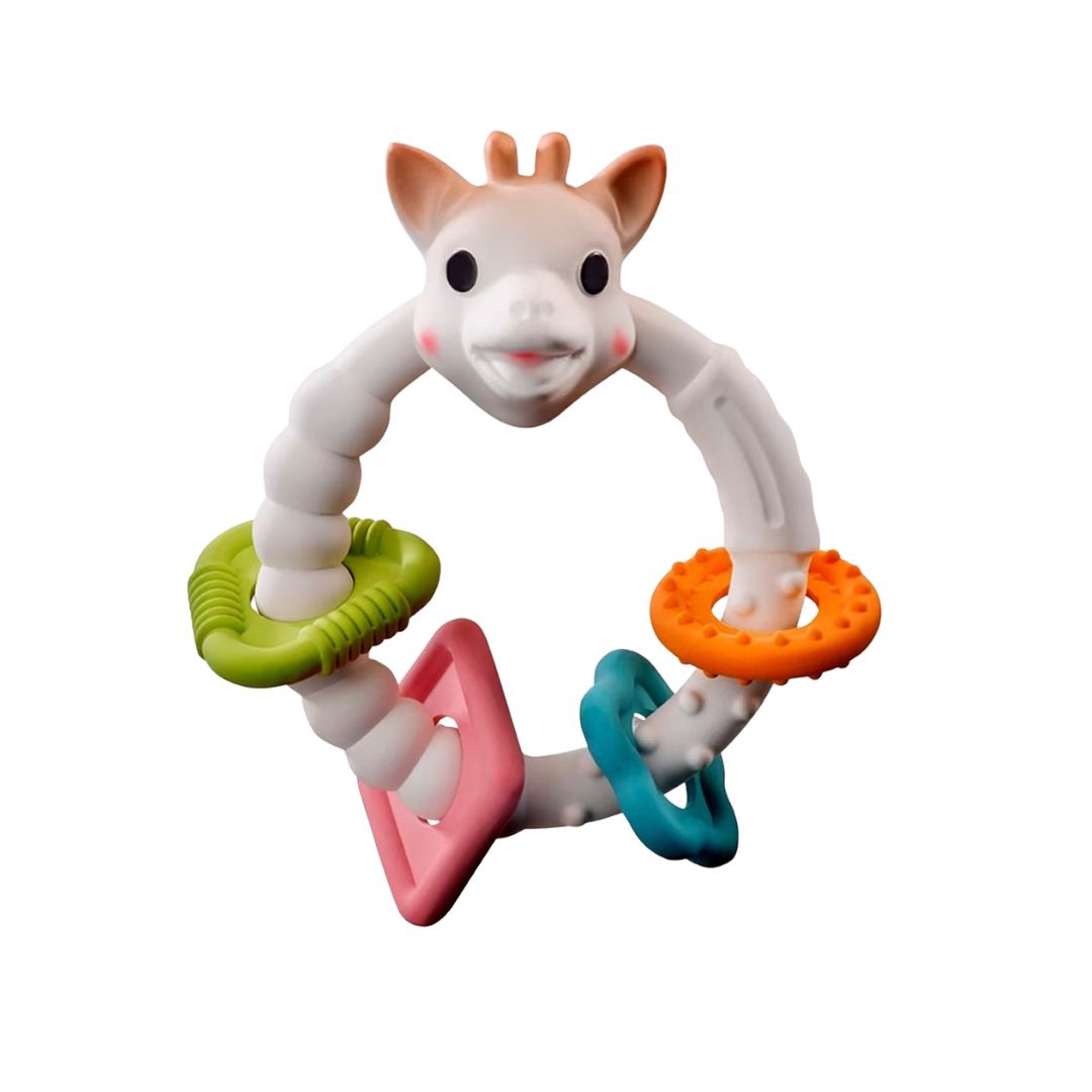 Sophie la Girafe Colo'rings teething ring toy with a giraffe head and four colorful textured rings in green, pink, orange, and teal, shown on a white background.