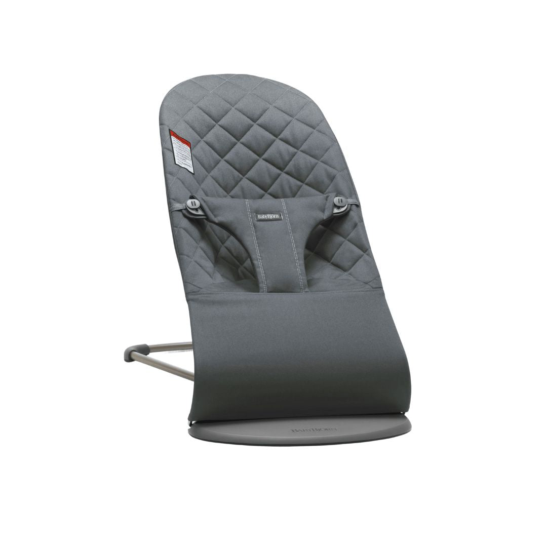 Gray baby Jorn baby bouncer with quilted design on a white background