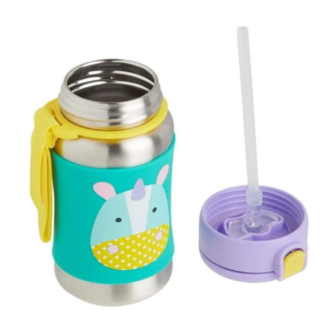 A Skip Hop stainless steel insulated tumbler with a turquoise animal-themed sleeve, yellow strap, and a separate lavender lid with a clear straw, shown on a white background.