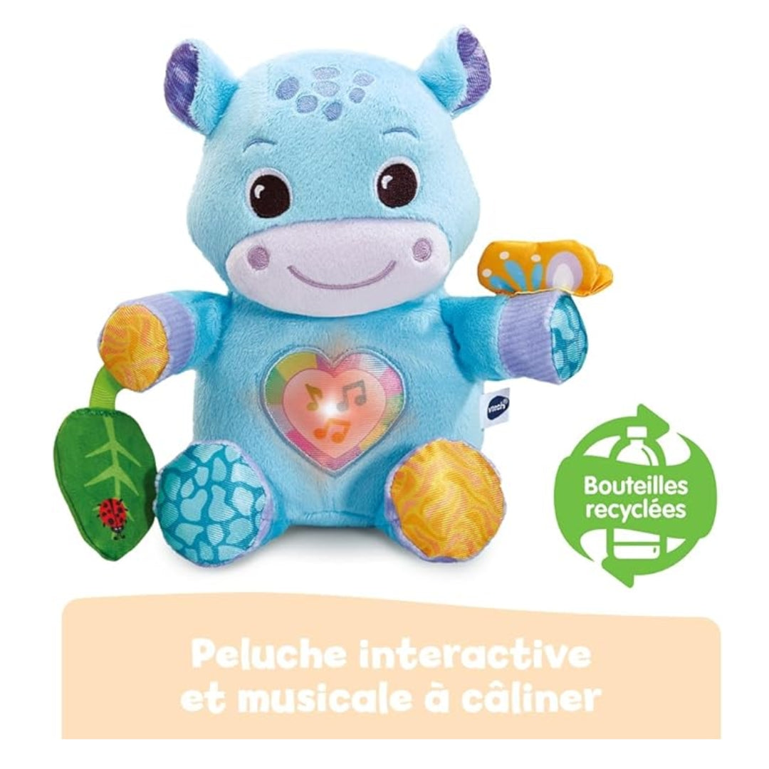 Vtech Blue plush toy with interactive elements on a white background